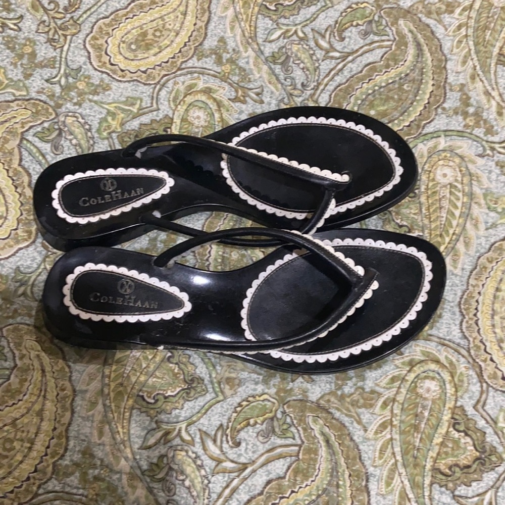 Adorable ColeHaan sandals. Black with white trim.